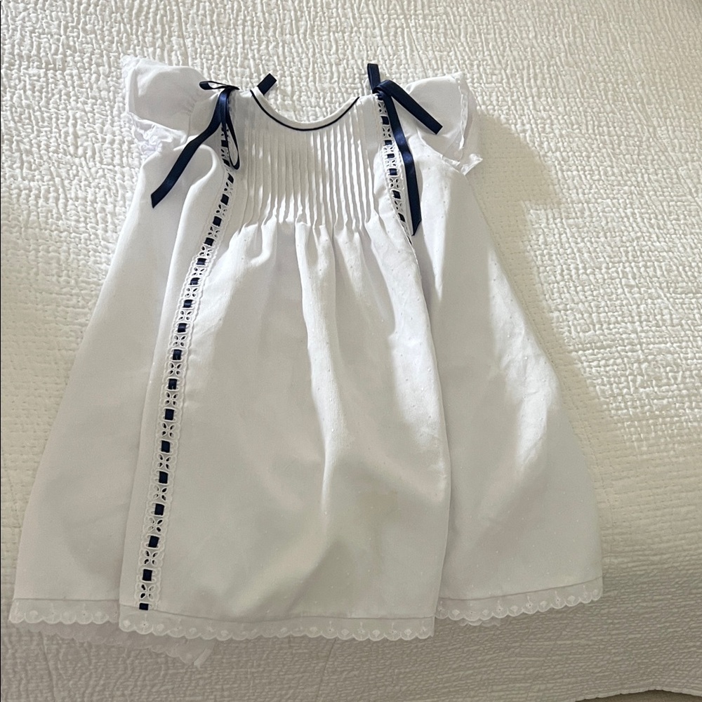 White Baby Dress with Navy Ribbon Details